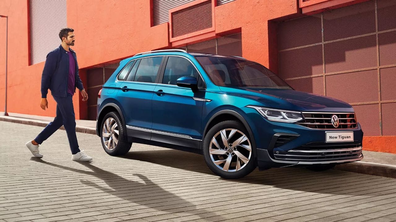 volkswagen india enhance flagship suv tiguan with dual tone interior wireless charger rde compliant