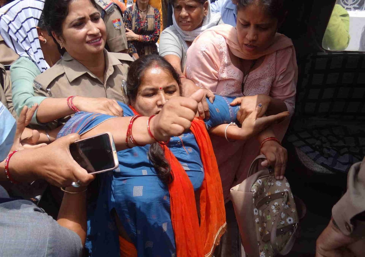 Cabinet Minister Premchand Aggarwal assault on a youth Police detained woman who was going to meet CM