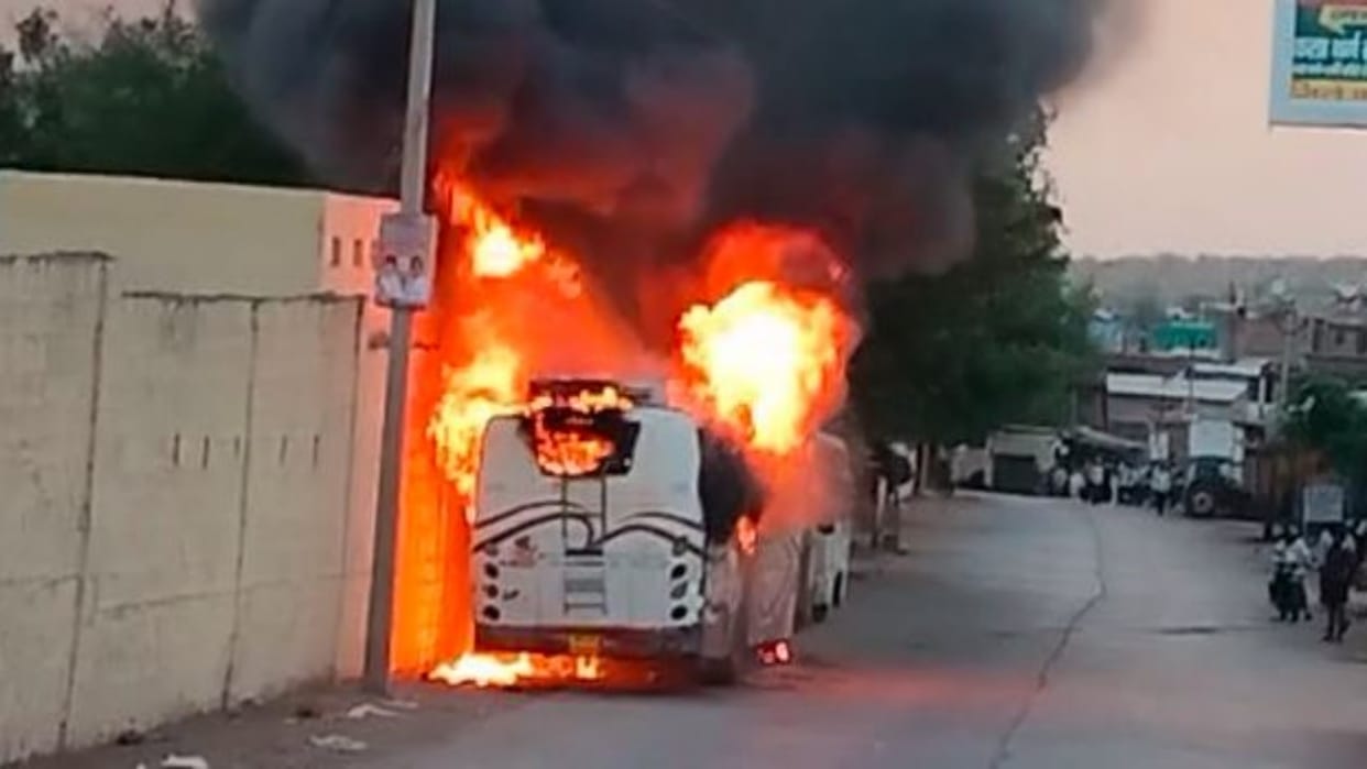 Dholpur News wire of high tension line broke and fell on the private bus the bus burnt to ashes