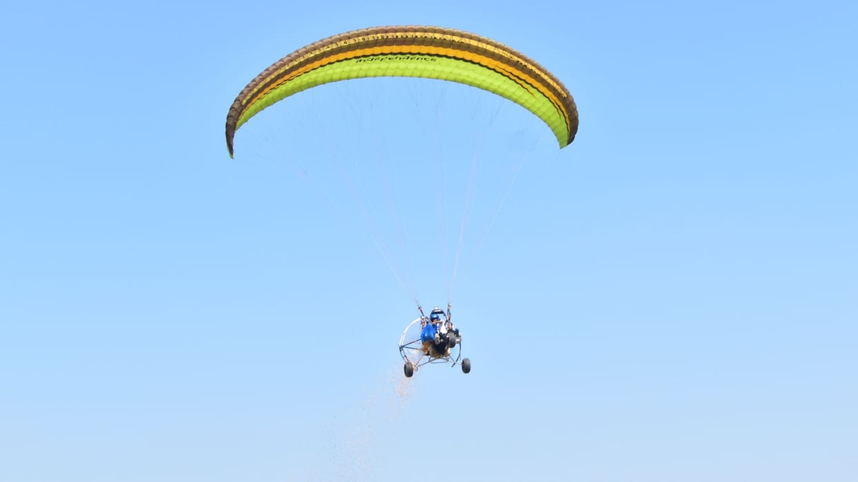 Powered paragliding near Androli una scenic view of gobind sagar lake