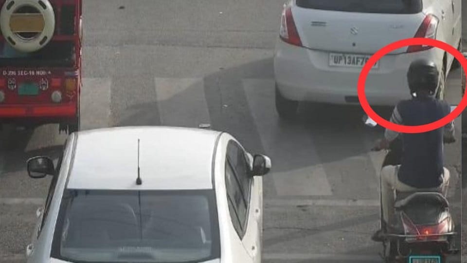E-scooty rider wearing helmet was challaned for no helmet