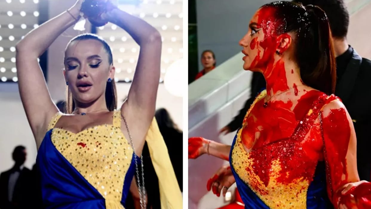 Cannes 2023 Protester dressed in ukrainian colours pours fake blood on himself on cannes red carpet