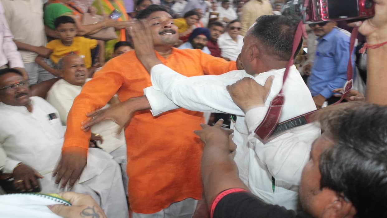 BJP leaders have beaten up to councilors for sitting on chair during Vande Mataram in mayor swearing ceremony