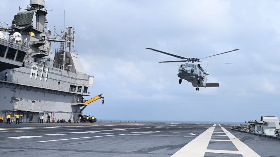 Indian Navy Anti Submarine MH60R helicopter lands For first time on INS Vikrant