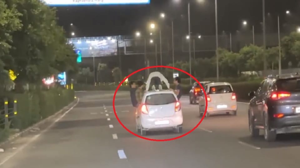 Video of youth doing stunts on the roof of a car in Gurugram went viral