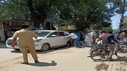 cabinet minister suresh khanna car got stuck in a pit dug for sewer line in shahjahanpur