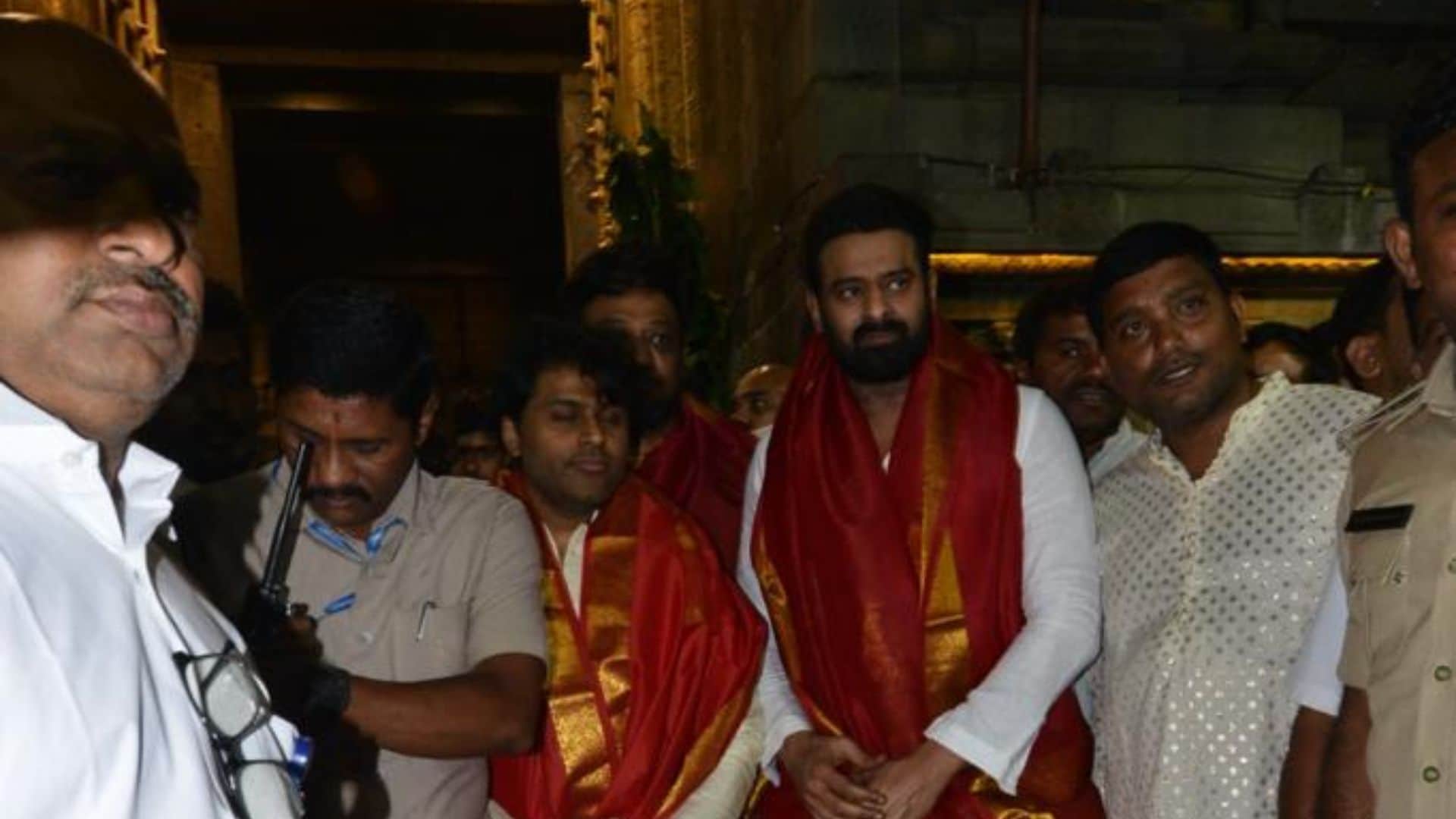 ahead of adipurush pre release event prabhas reached tirumala temple and seeks blessings