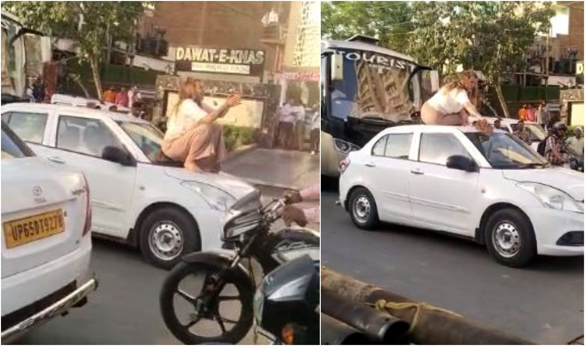 High voltage Drama of foreign woman in middle of road in Varanasi video viral