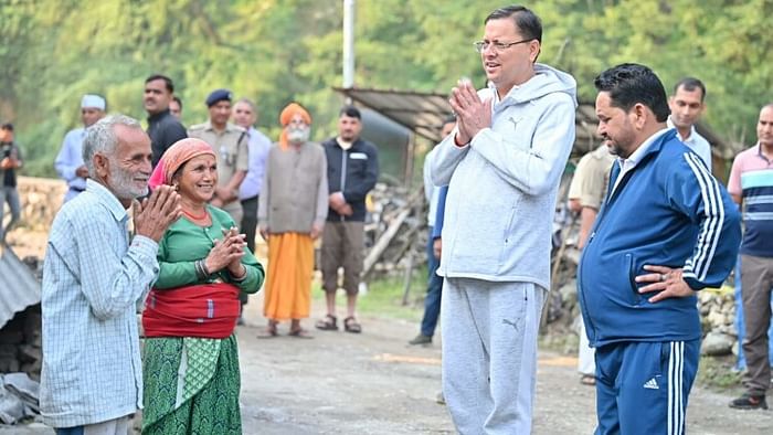 CM Dhami two-day Uttarkashi tour went on morning walk sowed Mandua plowed the fields with power weeder
