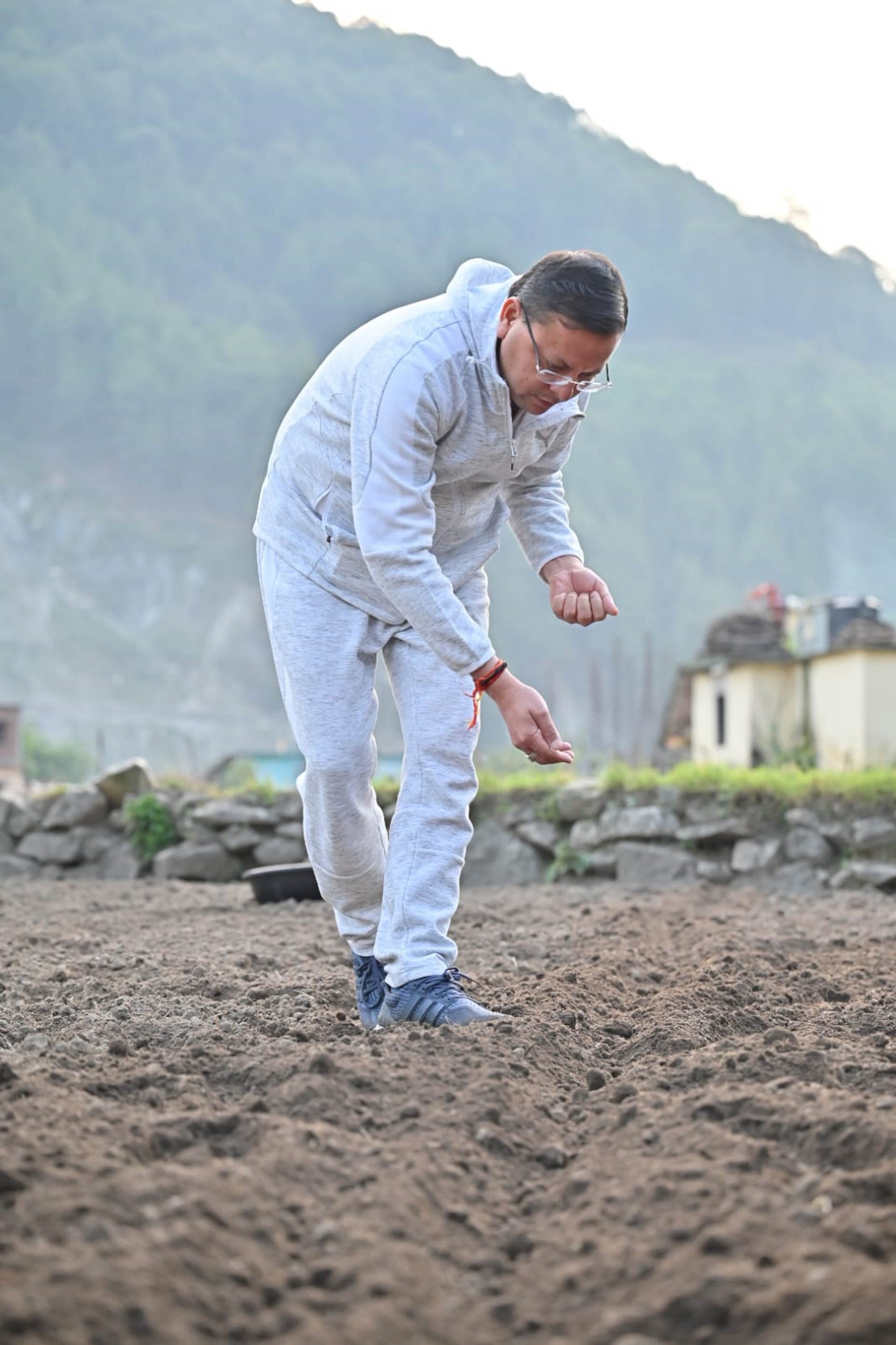 CM Dhami two-day Uttarkashi tour went on morning walk sowed Mandua plowed the fields with power weeder