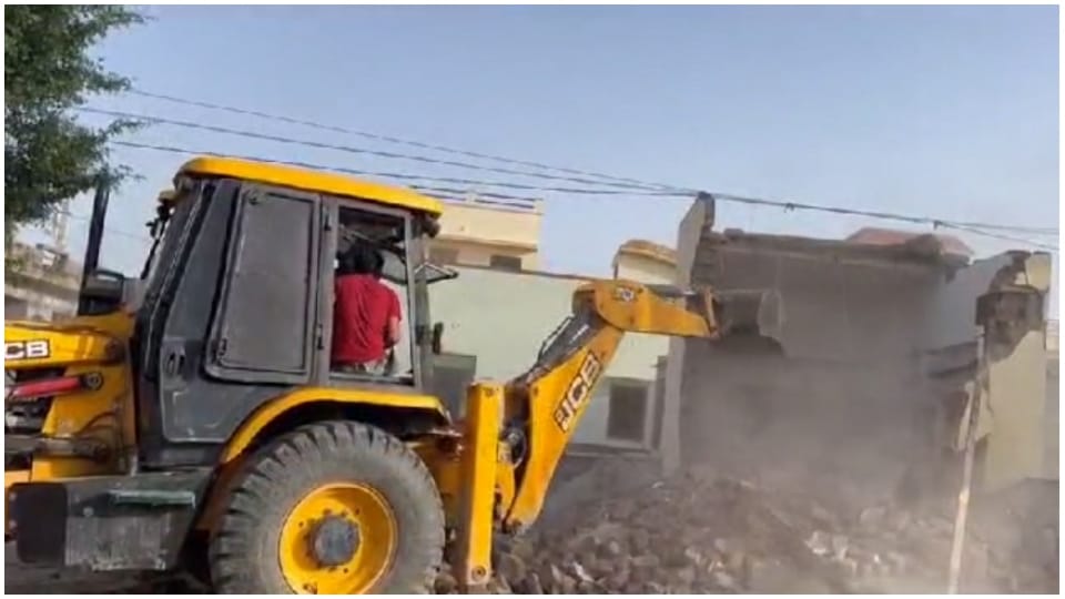 Police fired  bulldozer at the house of Danaram right hand of gangster Rohit Godara in Bikaner