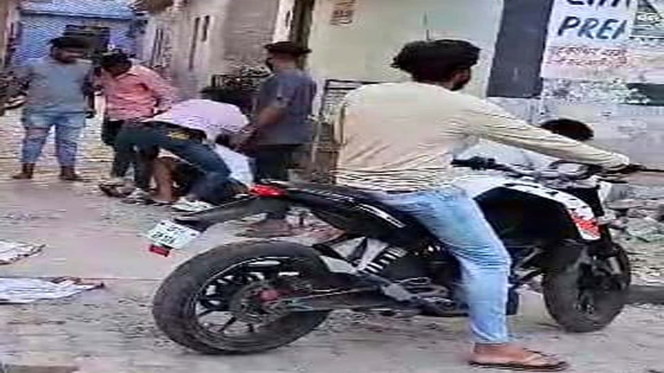 surrounded the young man and beat him mercilessly