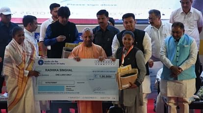 CM Yogi Adityanath honours UP Board toppers in Lok Bhawan in Lucknow.