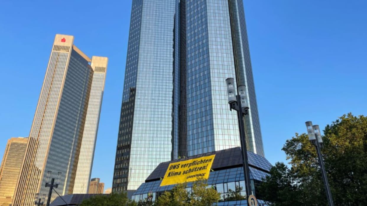 Greenpeace activists climb Deutsche Bank building to protest against investment policies