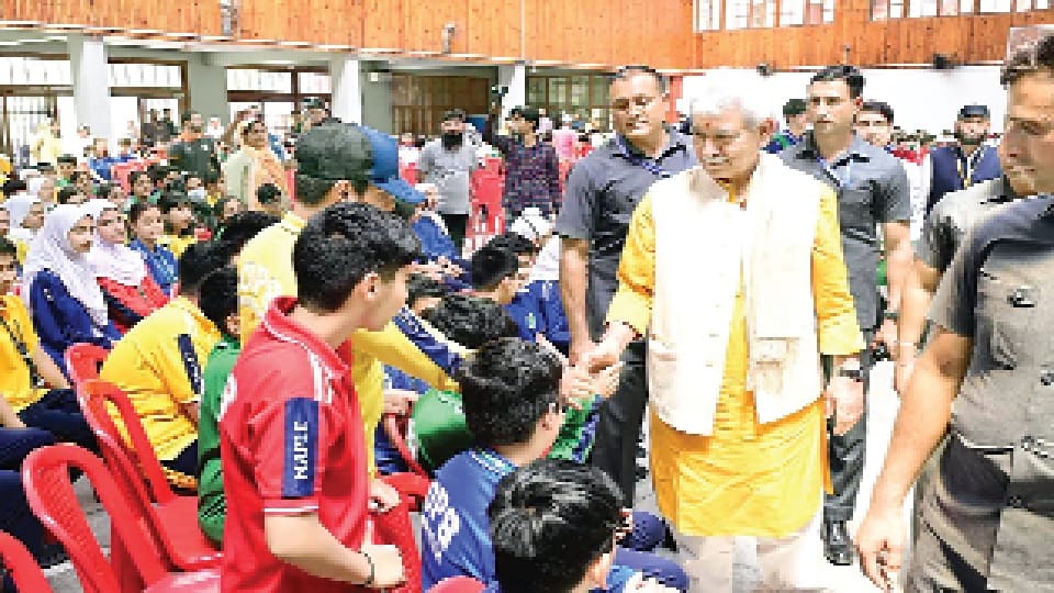 JK LG Manoj Sinha gifts expensive watch to student