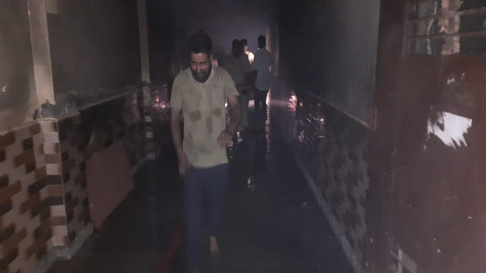 Fire broke out in the parking lot of a four-storey flat in Ghaziabad