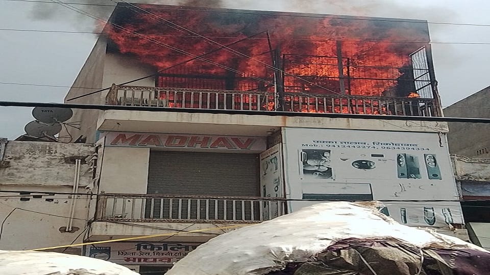 Fire broke out in the electronics shop spark from the wire caused havoc