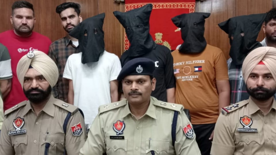 Moga police arrested four robbers who looted grocery trader in police uniform