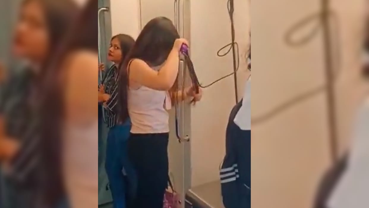 delhi metro girl hair straightening in metro vdieo viral on social media