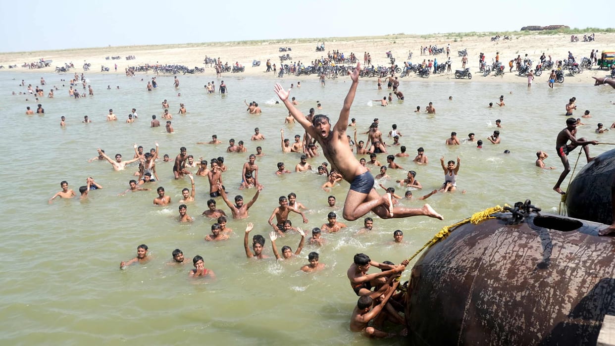 Rapti river giving relief from heat, youth made swimming pool