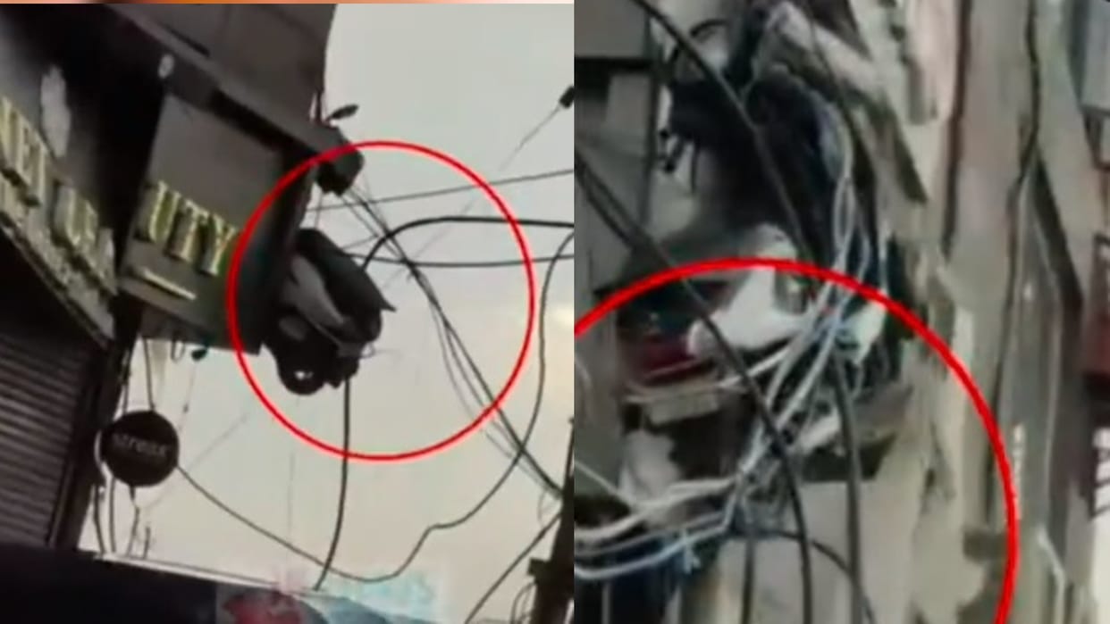 scooty viral video hanging on electricity wires in jammu kashmir viral on social media