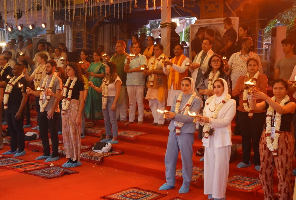 G20 Summit Uttarakhand Foreign guests doing yoga meditation at Beatles Ashram and Ganga Aarti