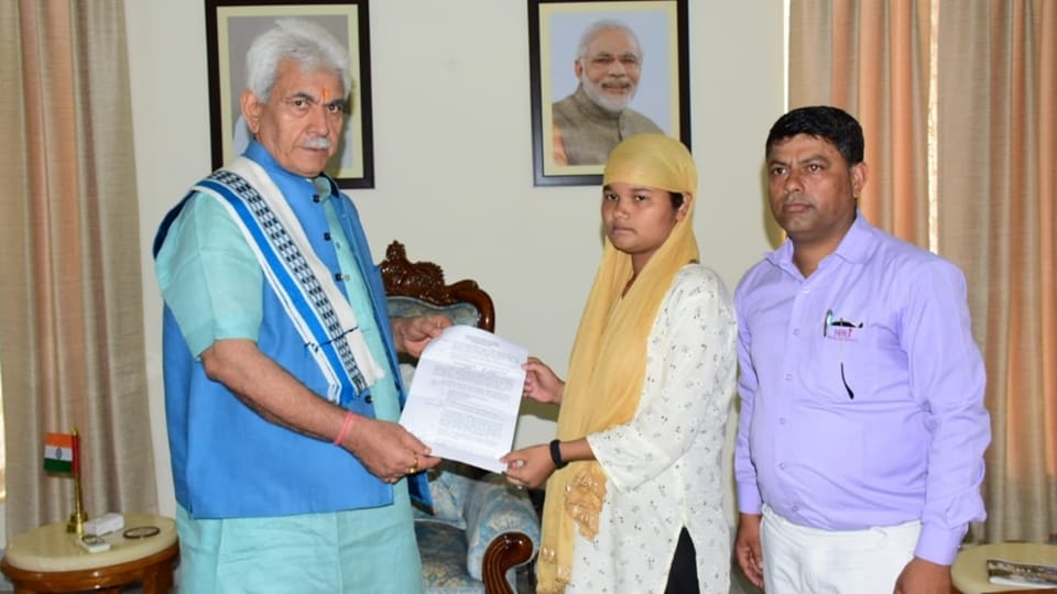 lg Manoj Sinha handed over appointment letter to wife of circus worker Deepu killed in anantnag