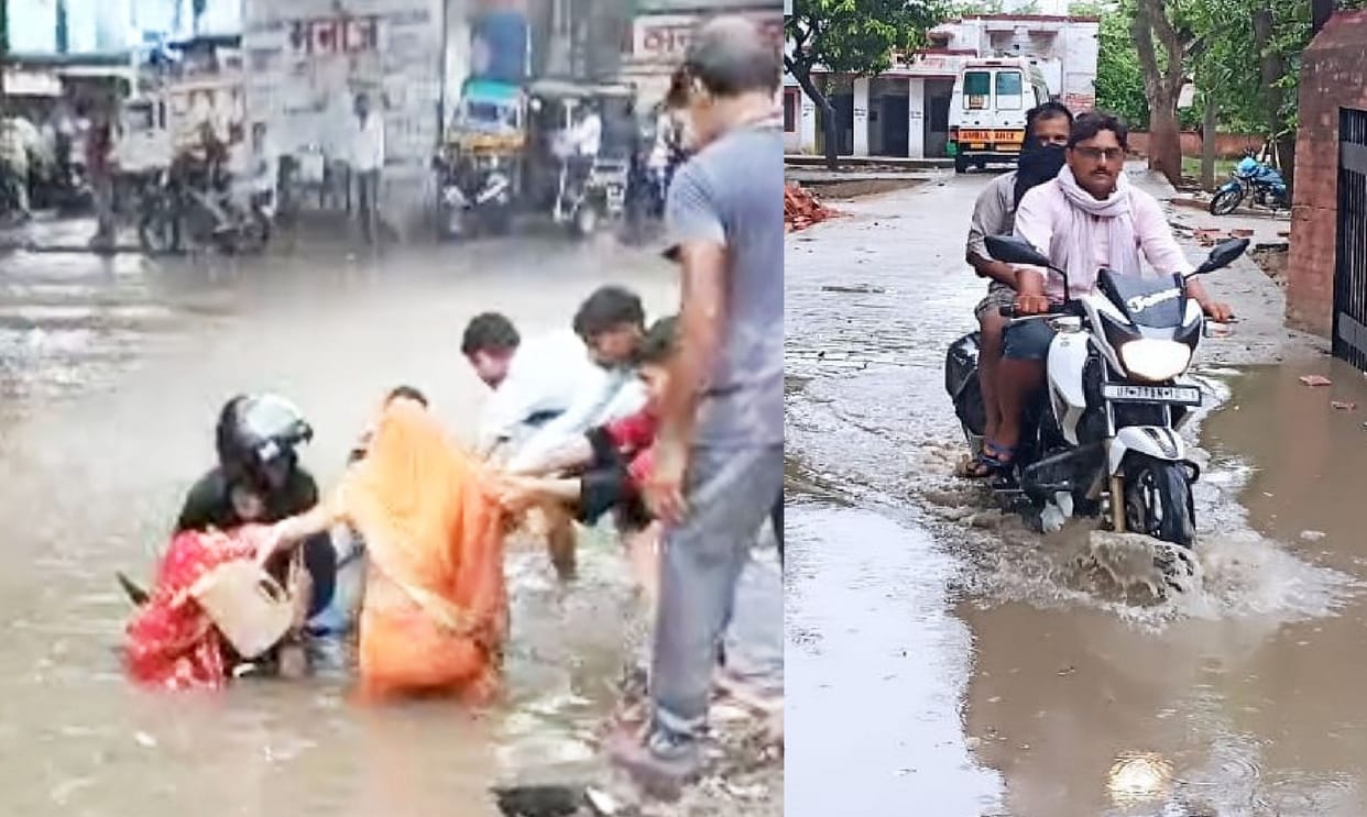 Crossroads became an island due to rain,  Bike got submerged in water, then waterlogged was evacuated by tanke