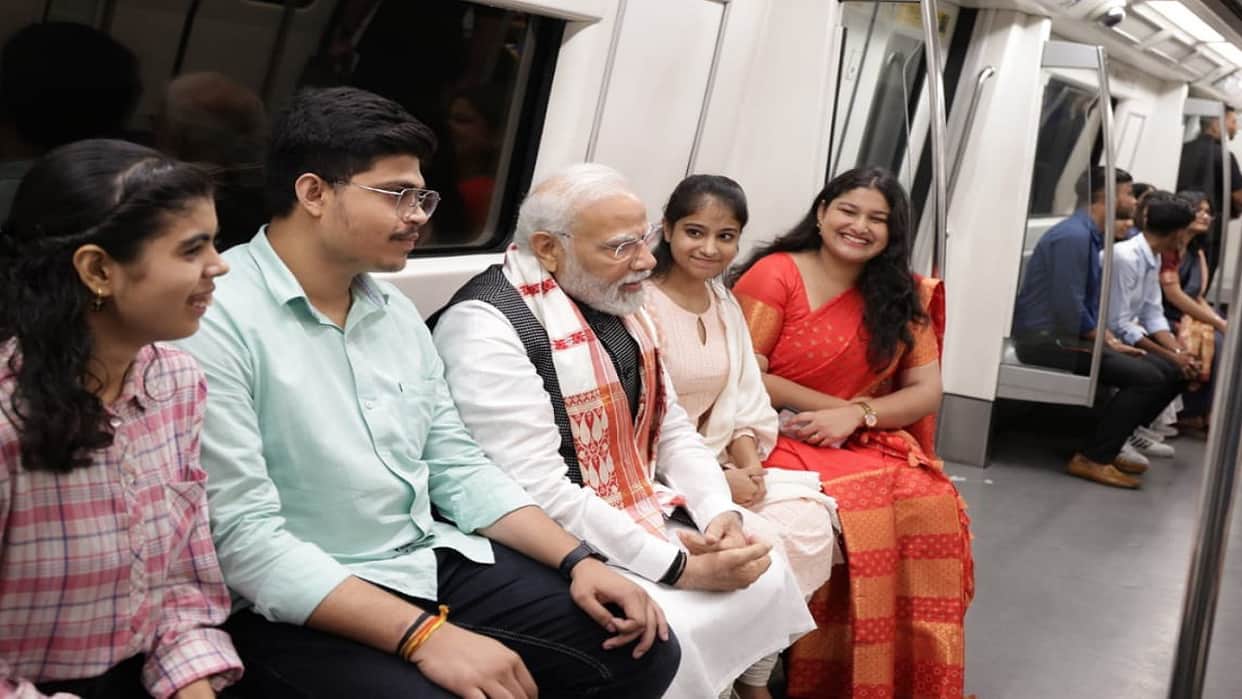 PM Narendra Modi reached Delhi University by metro interacted with passengers inside metro