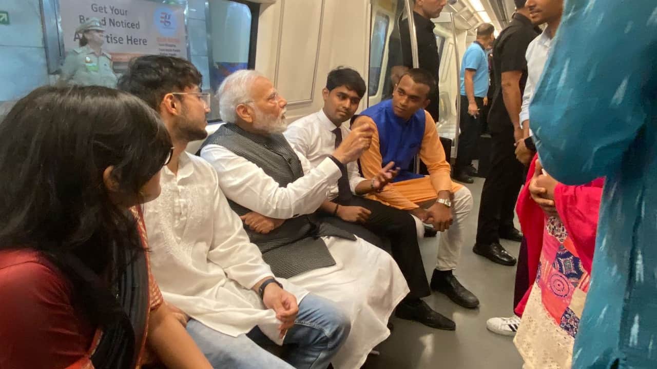 PM Narendra Modi reached Delhi University by metro interacted with passengers inside metro
