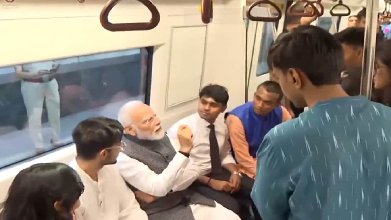 PM Narendra Modi reached Delhi University by metro interacted with passengers inside metro