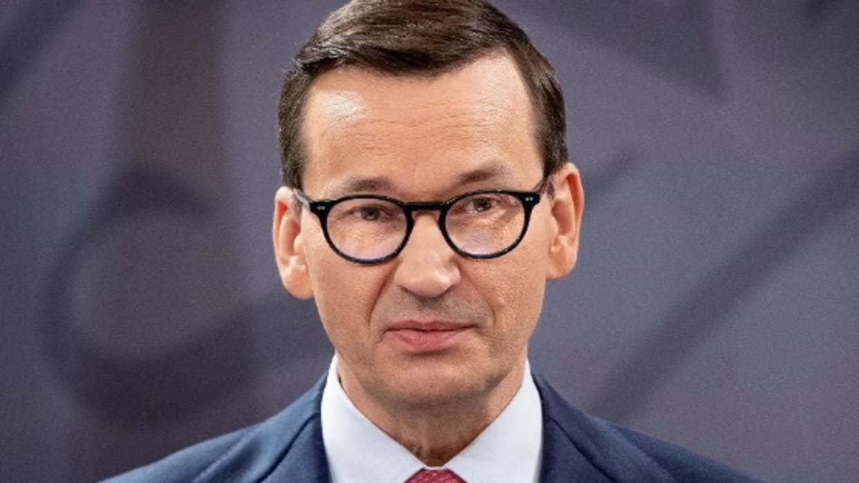 Poland vows not to bow to EU migrant rules and threatens to veto any refugee relocation plan