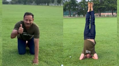 SP spokesperson wishes akhilesh yadav on his birthday by doing shirshasan.