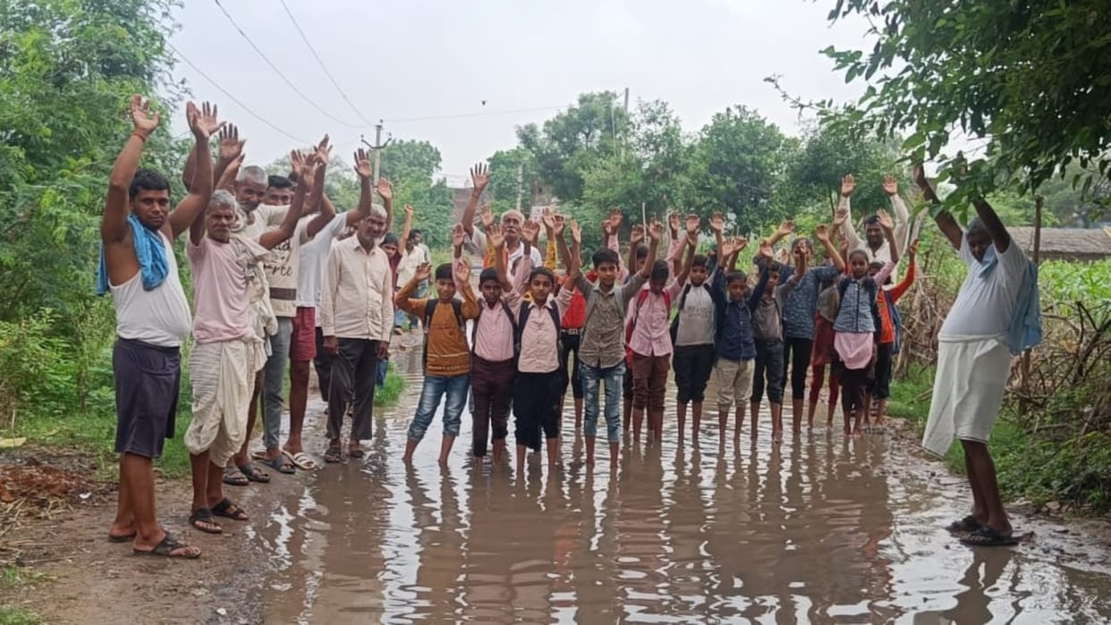 Dholpur News School children are facing problems due to water logging on way villagers demonstrated