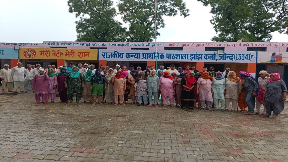 Villagers protest against school merging in Jhanj Kalan of Jind, lock gate by stopping staff outside