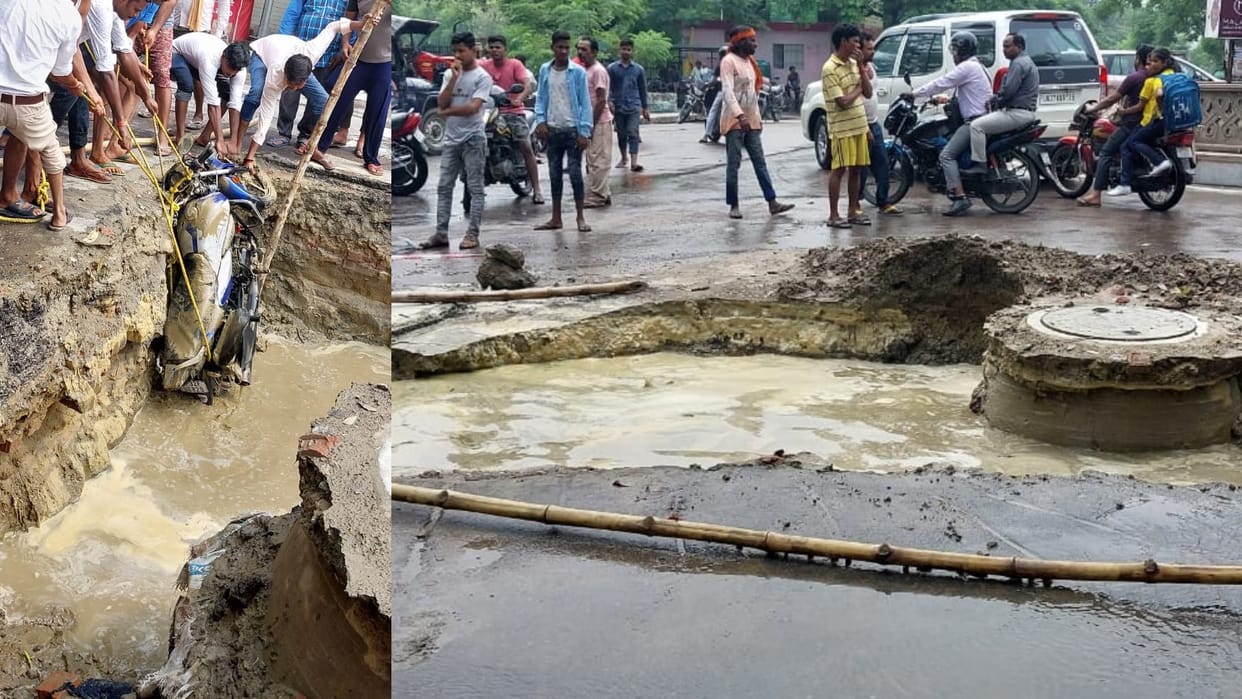 A man falls into a pathole when the road sinks in Ashiyana Lucknow.