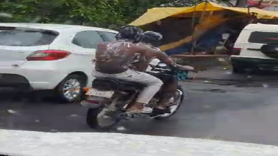 Video bathing on road with a moving bike in Dantewada goes viral