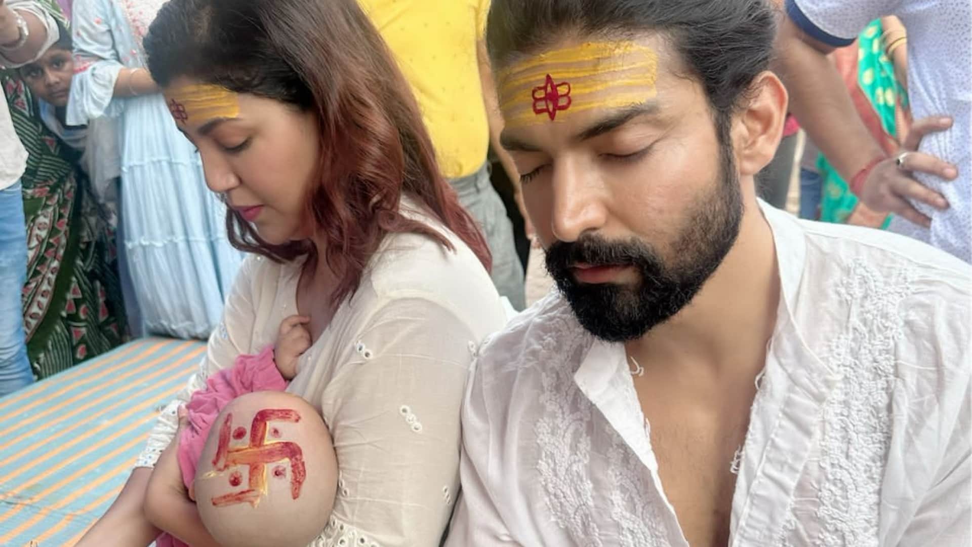 Debina Bonnerjee and Gurmeet Choudhary visit Varanasi for younger daughter Divisha mundan read