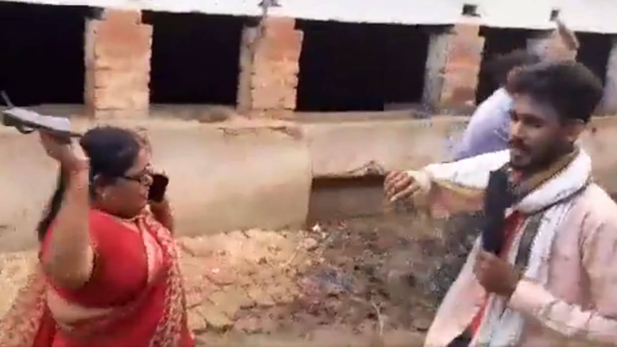 A woman beats a youtuber with chappal and stick for making video of an ANM center.