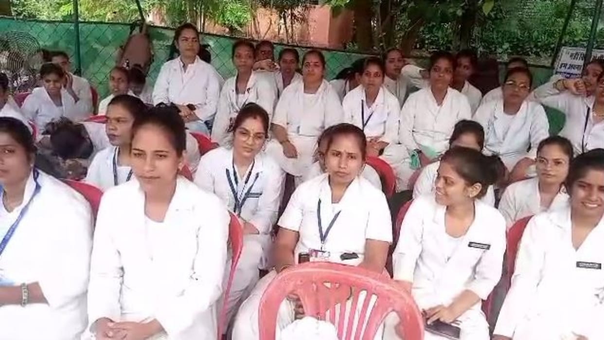 Shivpuri Nursing officer sitting on dharna in front of collector office after being removed from district hosp