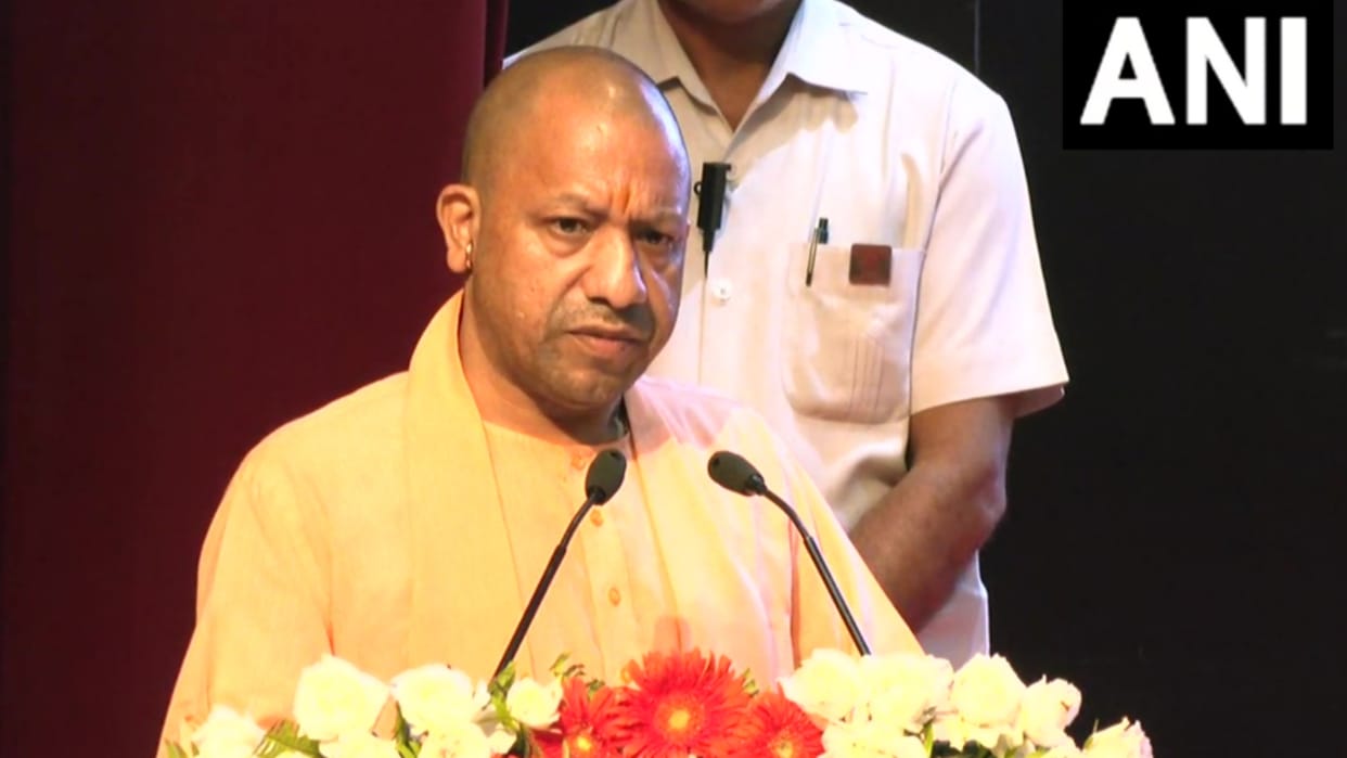 CM Yogi Adityanath distributes the joining letters to selected candidates.