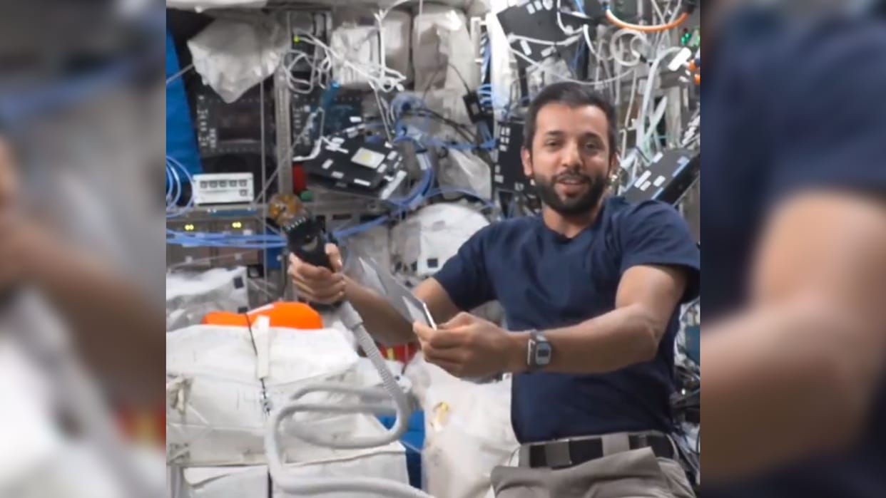 international space station uae astronaut sultan al neyadi cut his hair with vacuum trimmer nasa watch video
