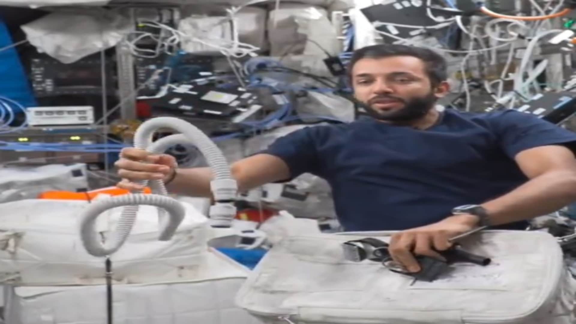 international space station uae astronaut sultan al neyadi cut his hair with vacuum trimmer nasa watch video