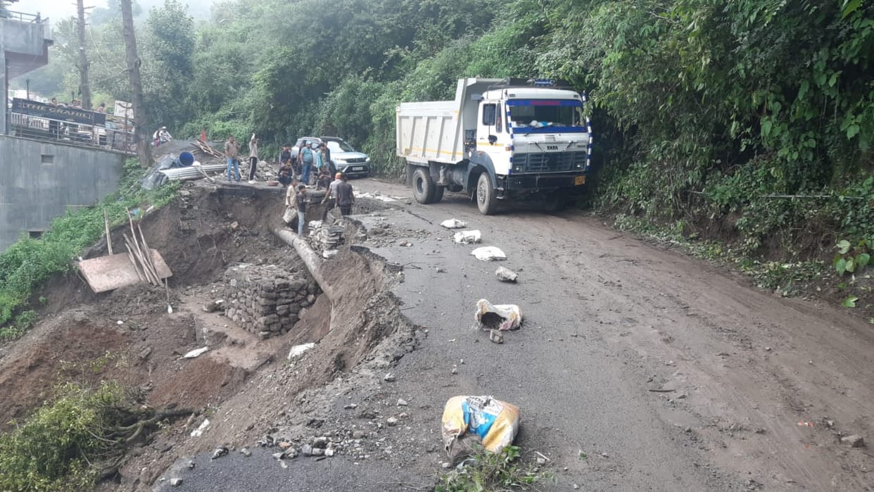 Mussoorie part of National Highway near Kempty has sunk in two places debris lying on road