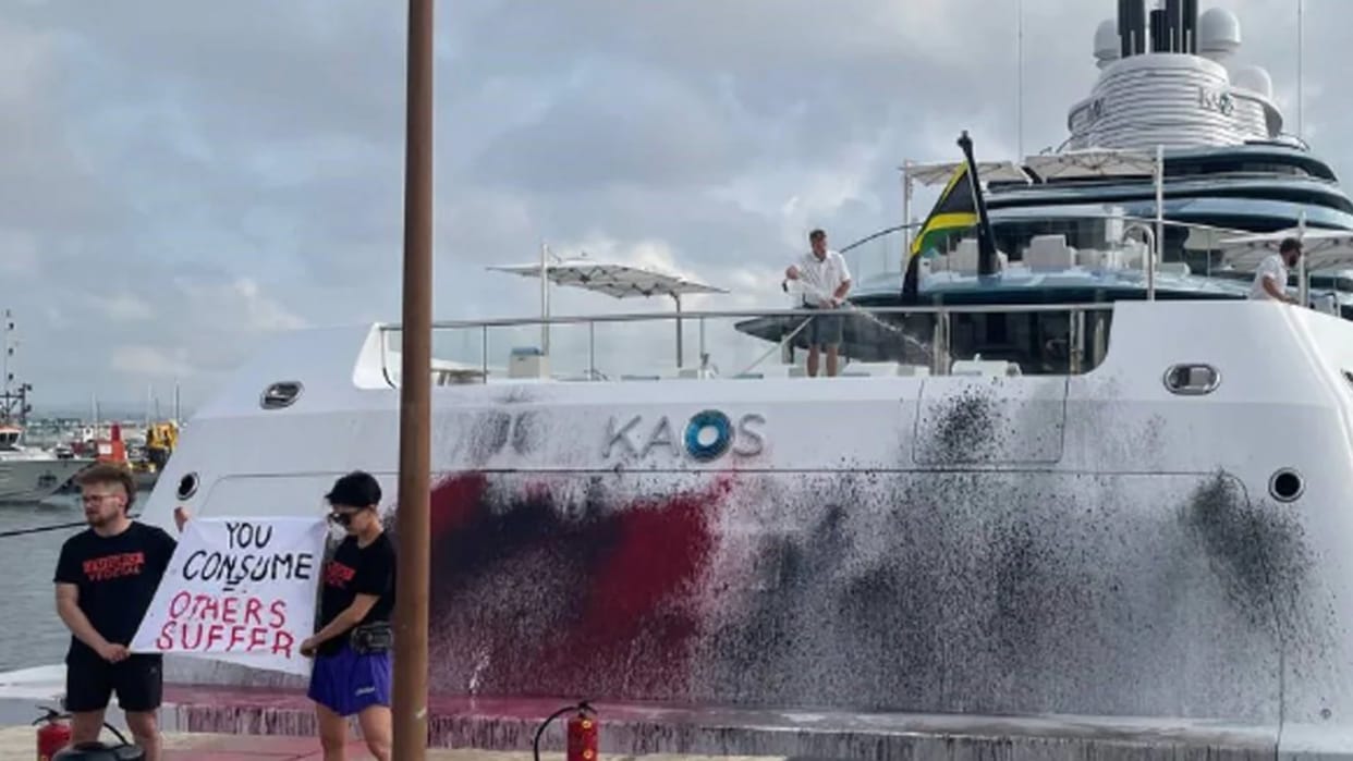 walmart heiress nancy walton luxury yatch vandalized deface by climate activist in spain