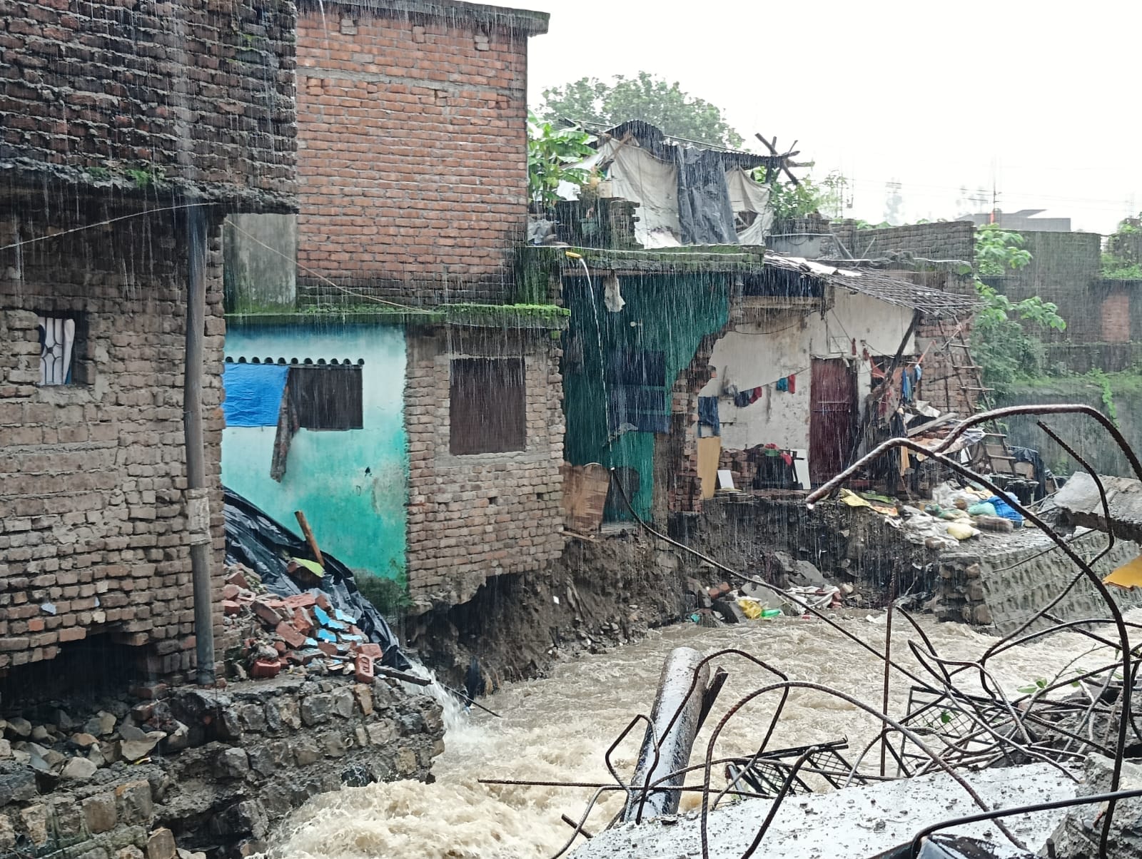 Dehradun Weather News many houses and shops Collapse after heavy rains Flood Like Condition