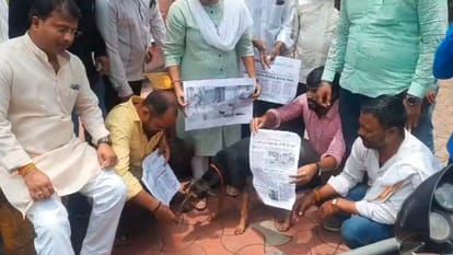 Leader of the Opposition was bitten by dogs and protest was lodged by playing bands in corporation premises