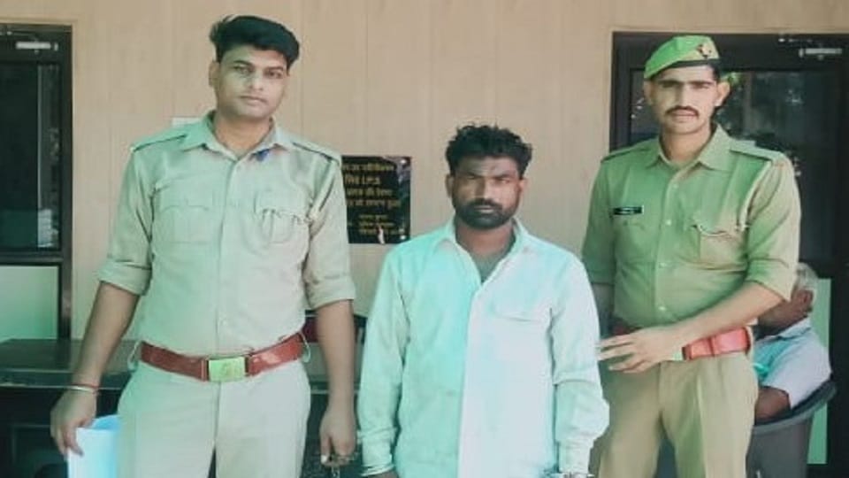 crook arrested for robbing farmer's seed store owner