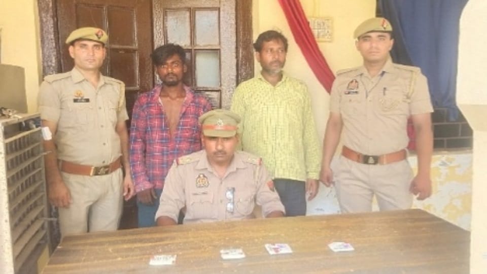 Two arrested for breaking into houses and stealing