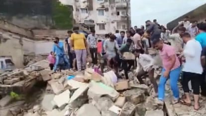 Gujarat Rains Building falls several trapped Rescue operation Monsoon Season Flood Situation news and updates